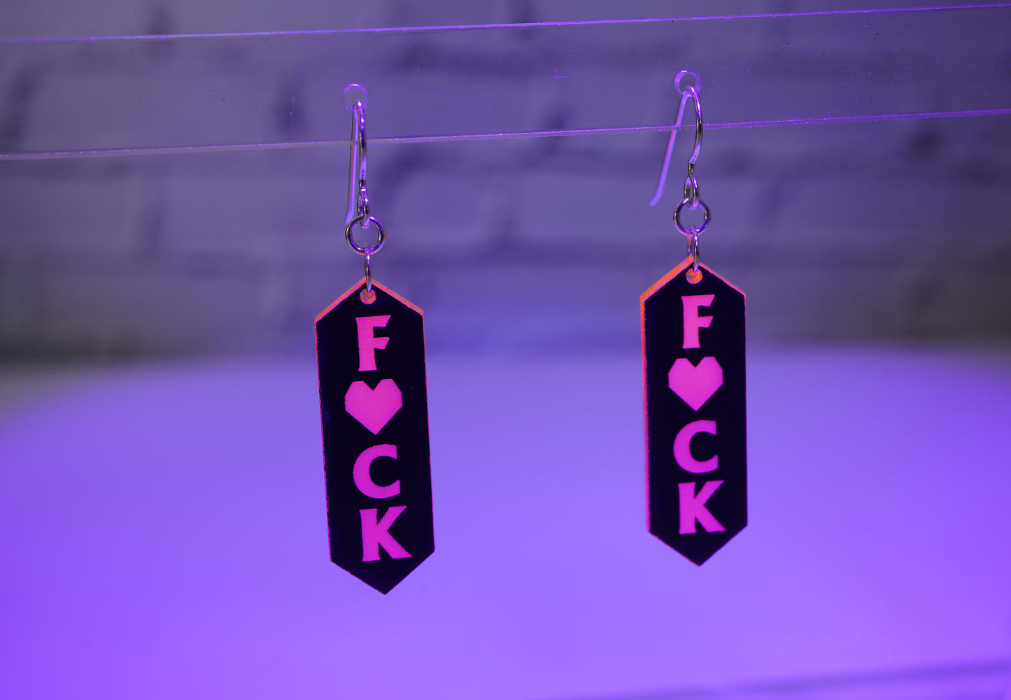 F word earrings