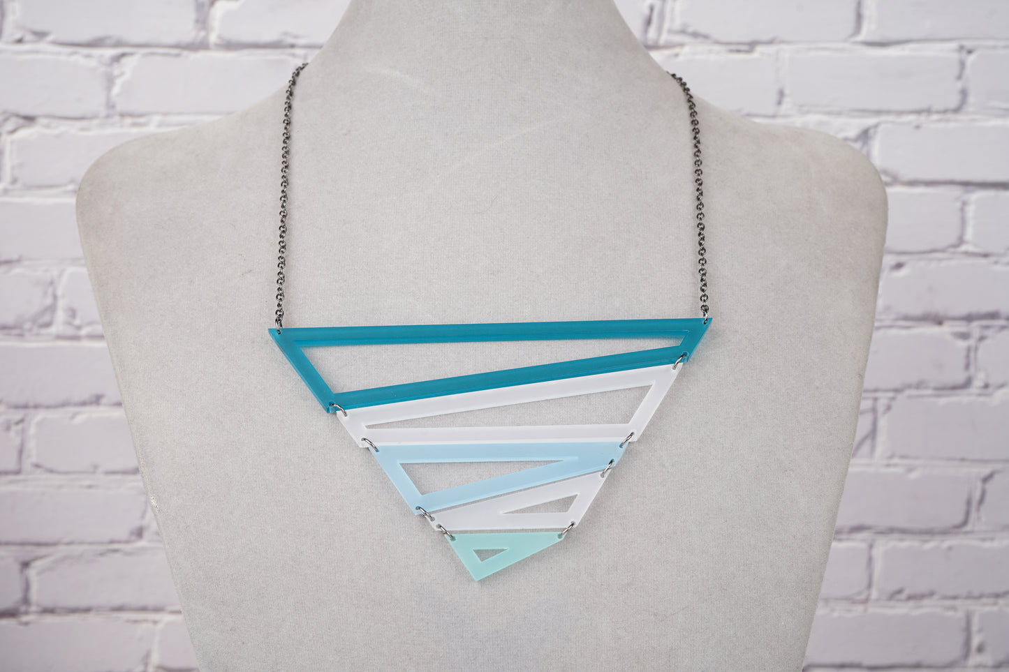 Blue geometric triangle necklace