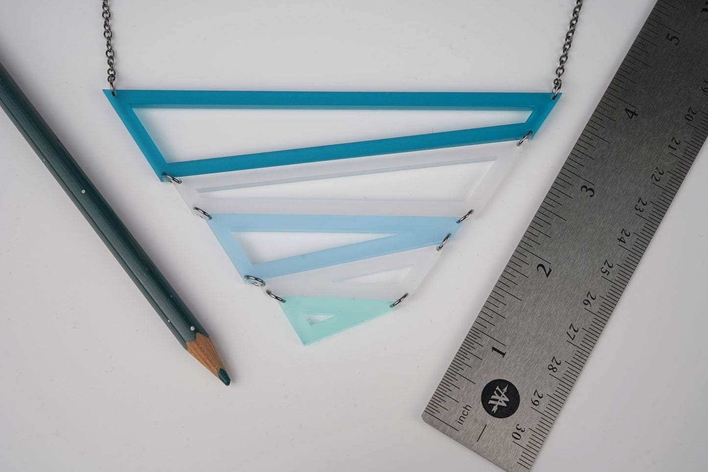 Blue geometric triangle necklace