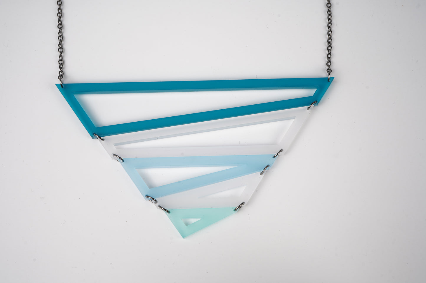 Blue geometric triangle necklace